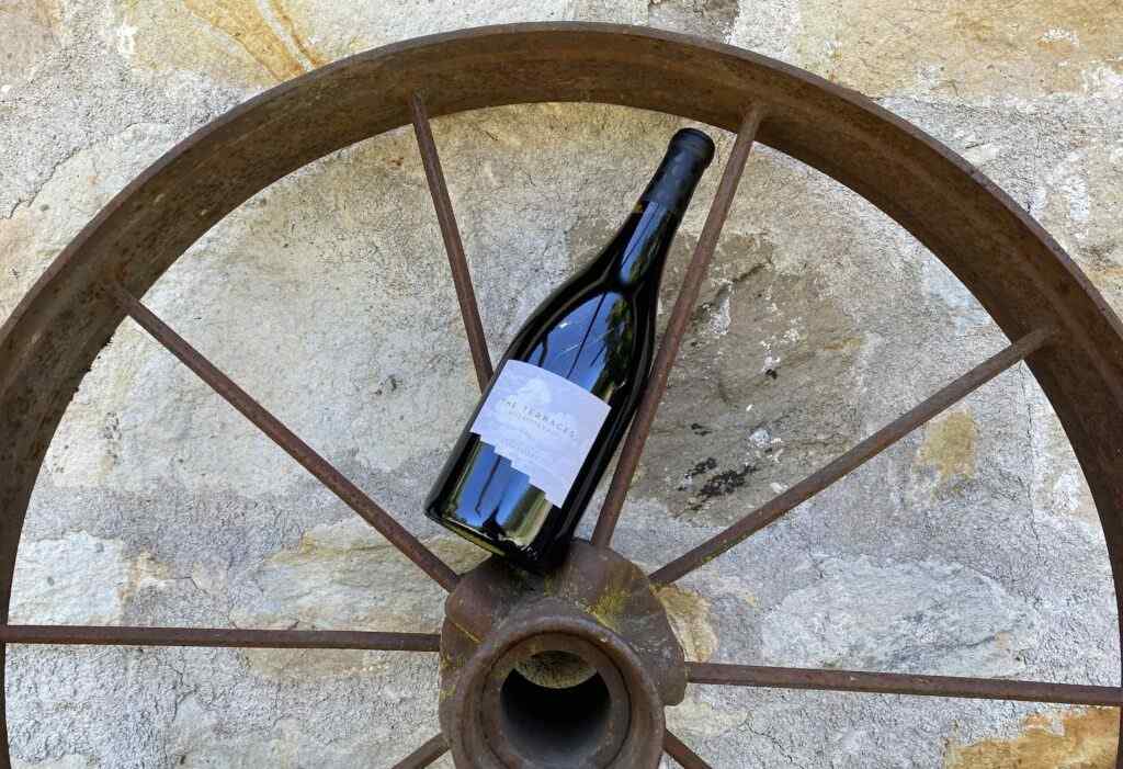 bottle in wagon wheel